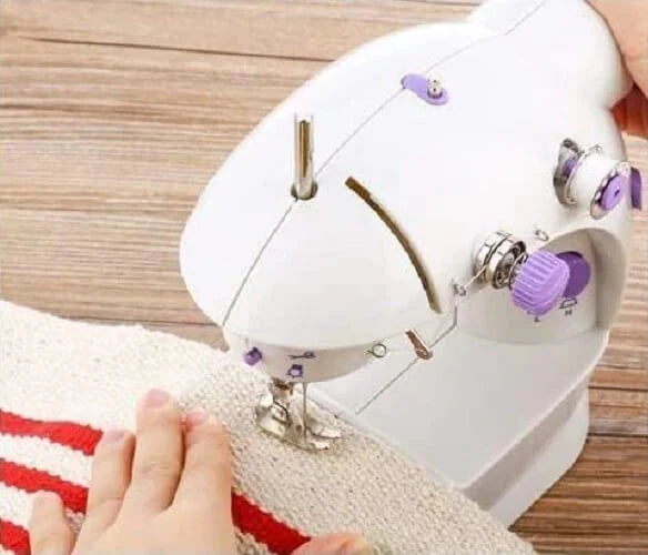 Mini portable sewing machine – photo 3