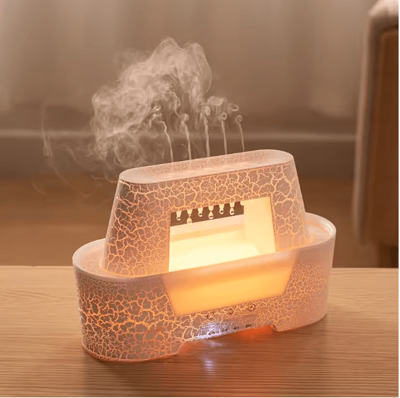Raindrop humidifier releasing mist with a warm glow